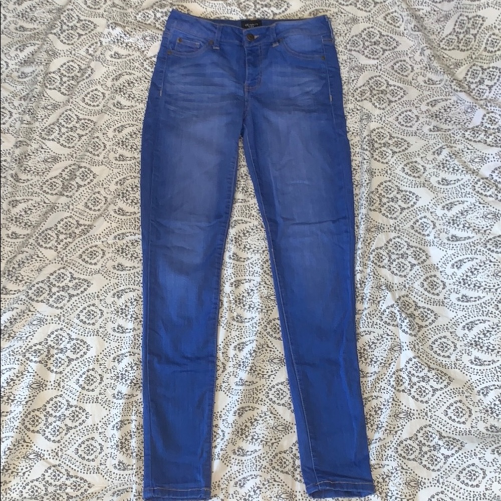 Bright blue skinny jeans. - Picture 1 of 2
